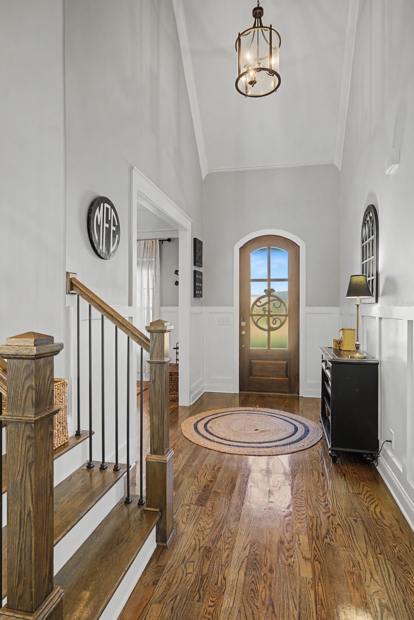 2965 Stewart Campbell Pointe Spring Hill, TN 37174 - Photo 4 of 48 a view of a livingroom with wooden floor and furniture