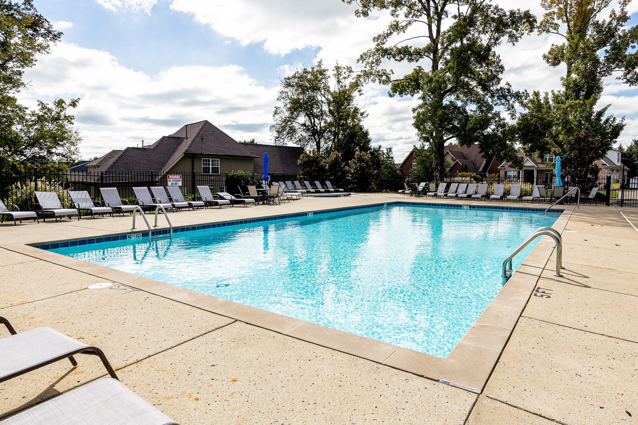 2965 Stewart Campbell Pointe Spring Hill, TN 37174 - Photo 47 of 48 a view of a swimming pool with a patio