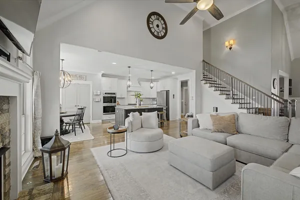 a living room with furniture and a table
