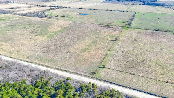 a view of a backyard of a house