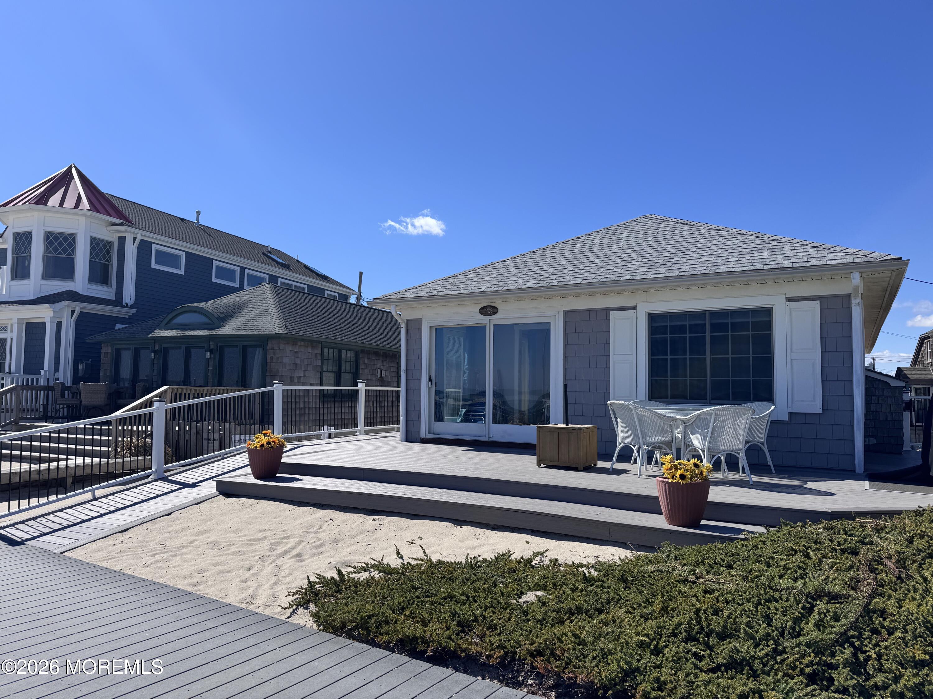 115 Boardwalk Point Pleasant Beach, NJ 08742 - Photo 1 of 23 a front view of a house with sitting area