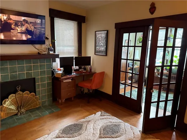 a workspace with furniture and window