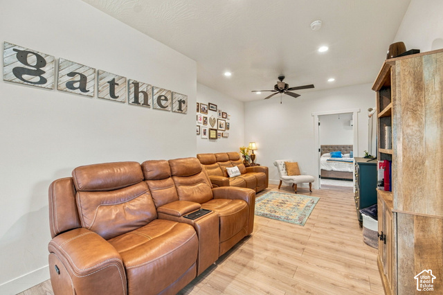 215 South Copper Road East Kanab, UT 84741 - Photo 17 of 41 Recessed ceiling lighting, wood-finish flooring, ceiling fan with light fixture, and white trim