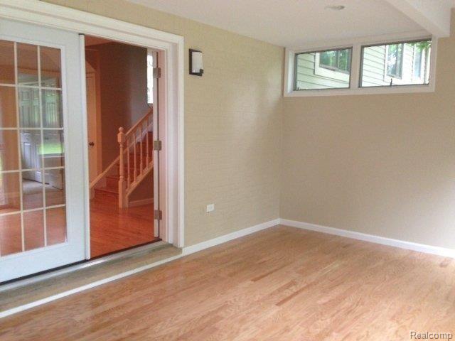2767 Bullard Road Hartland, MI 48353 - Photo 11 of 22 Three seasons room w-french door