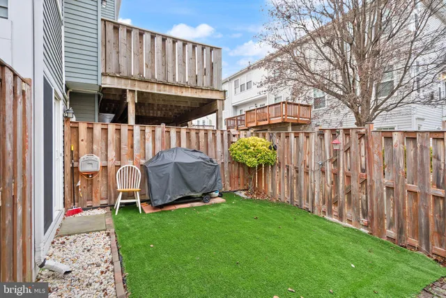 a view of a backyard with a garden