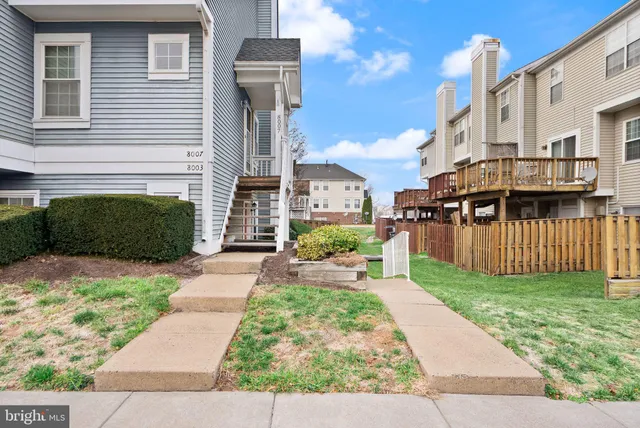 a view of a garden with pathway