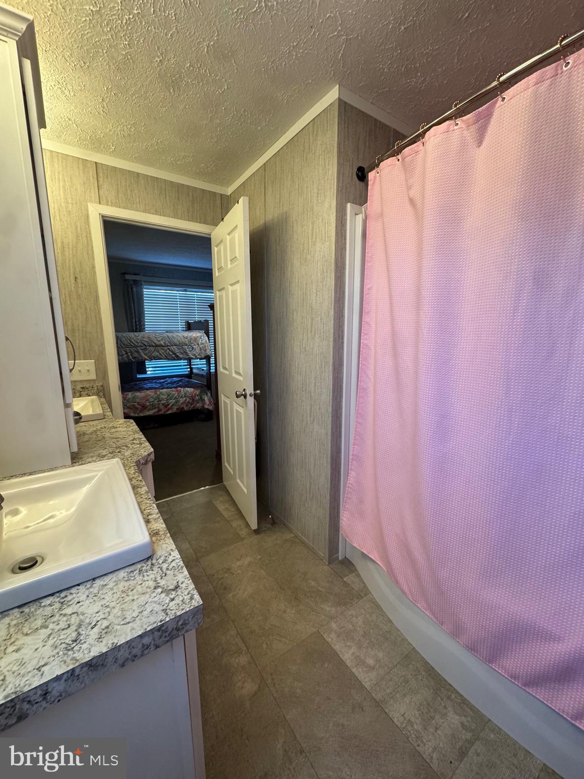 720 Mountain Road Pine Grove, PA 17963 - Photo 11 of 35 a bathroom with a granite countertop sink and a mirror