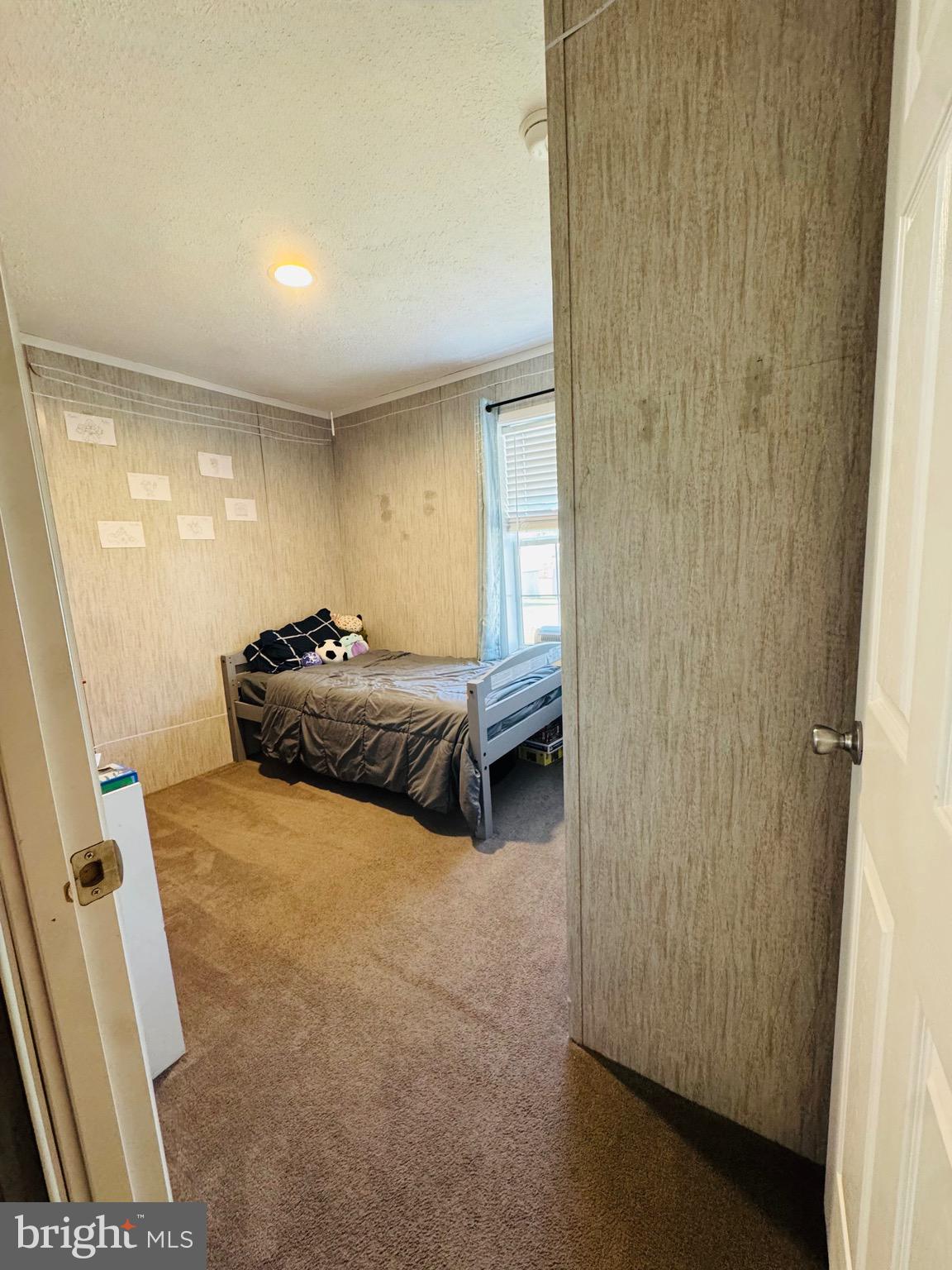 720 Mountain Road Pine Grove, PA 17963 - Photo 18 of 35 a spacious bedroom with a bed and a shower