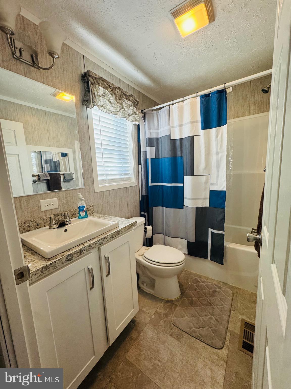 720 Mountain Road Pine Grove, PA 17963 - Photo 23 of 35 a view of bathroom with a toilet sink and mirror