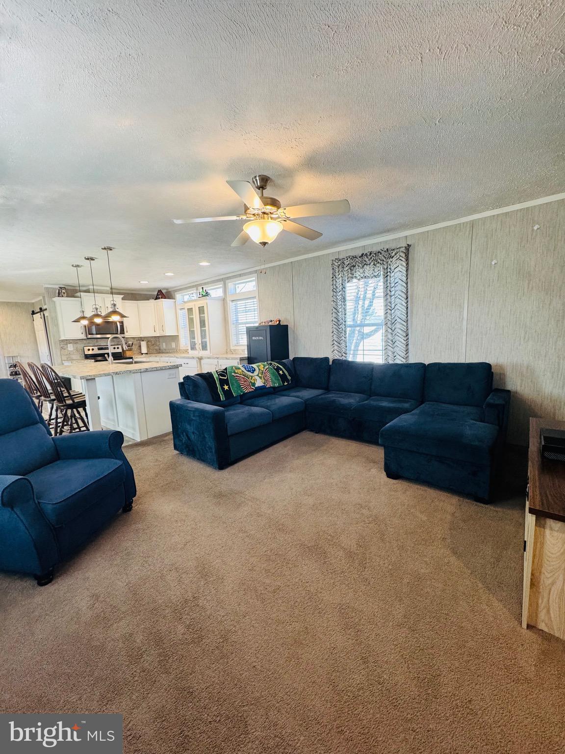 720 Mountain Road Pine Grove, PA 17963 - Photo 30 of 35 a living room with kitchen furniture and a kitchen view