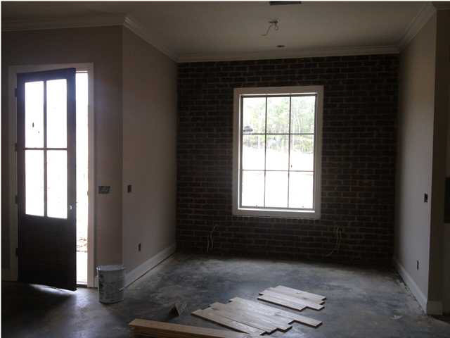 133 Fieldstone Lane Madison, MS 39110 - Photo 5 of 8 Brick wall in dining