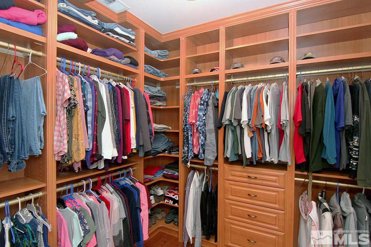10860 Rushing Flume Drive Reno, NV 89521 - Photo 14 of 23 a view of walk in closet with clothes