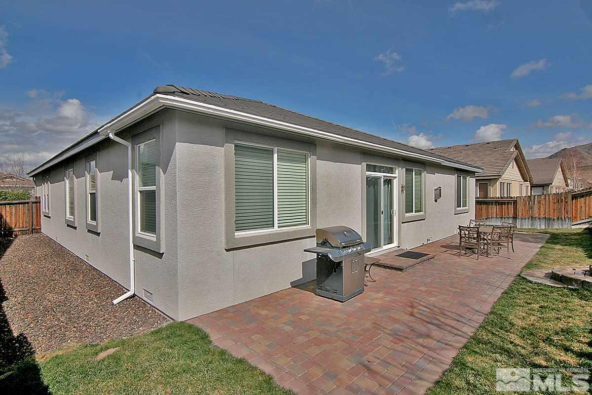 10860 Rushing Flume Drive Reno, NV 89521 - Photo 21 of 23 a front view of a house with patio