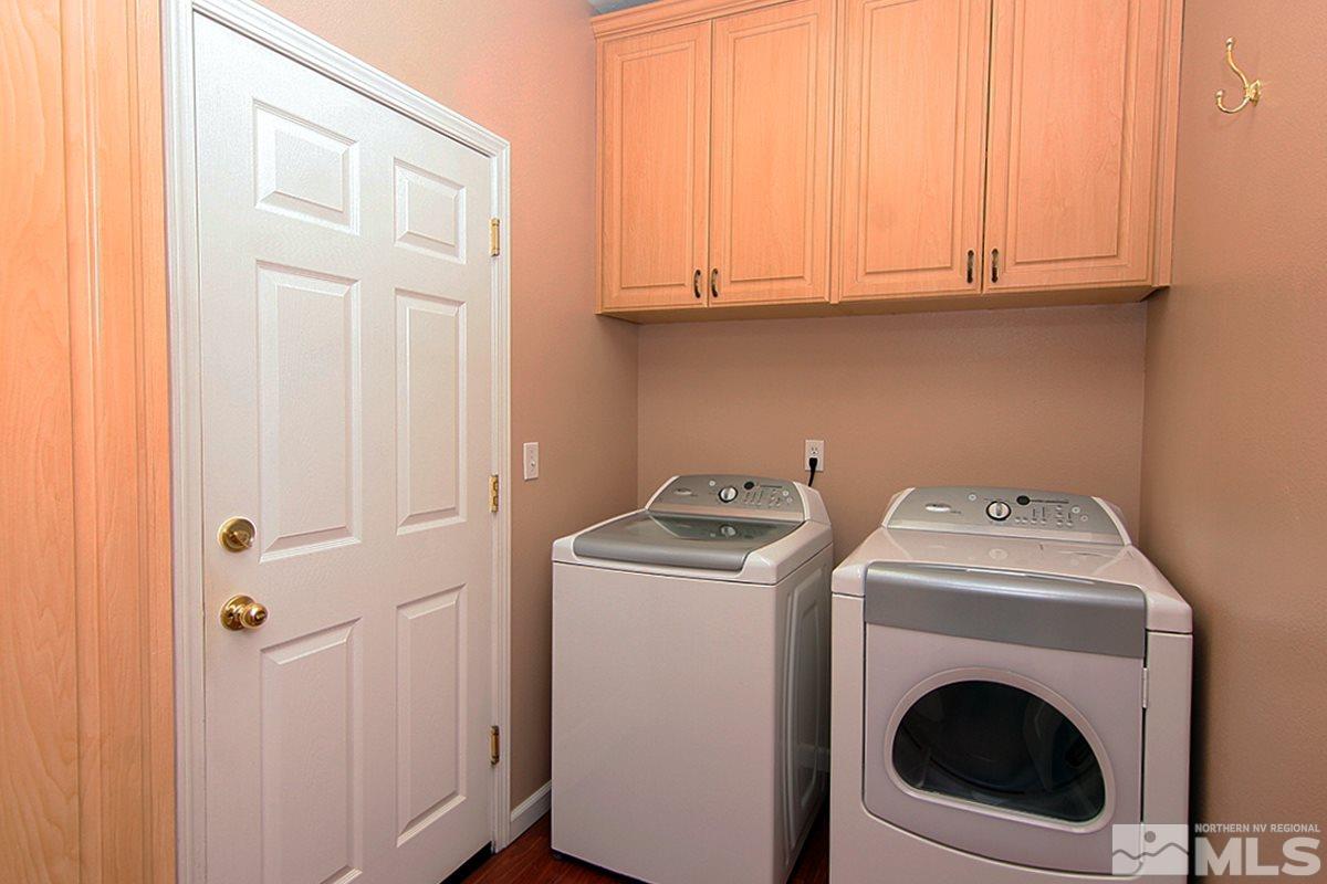 10860 Rushing Flume Drive Reno, NV 89521 - Photo 10 of 23 a utility room with dryer and washer