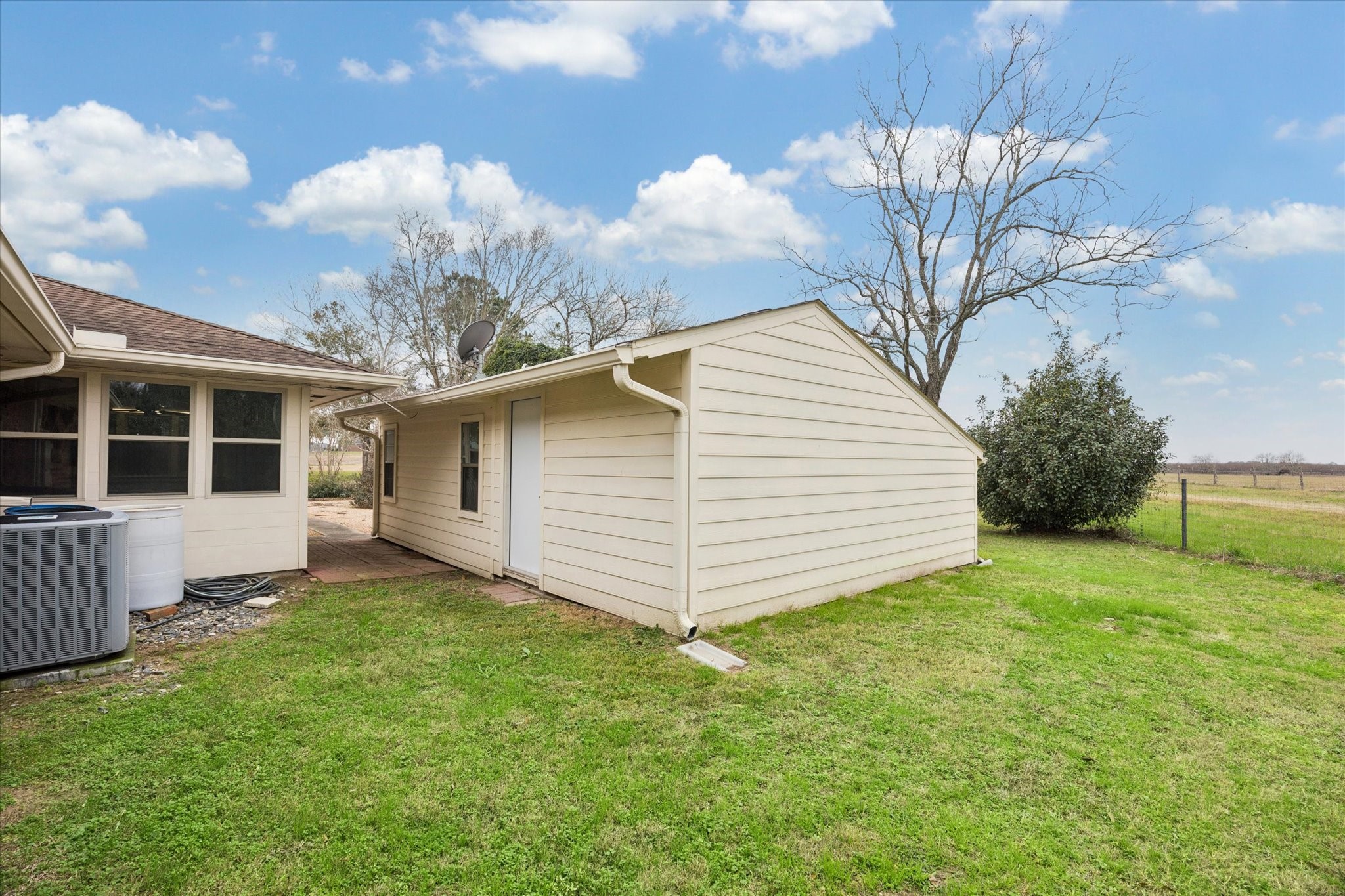 479 South Farm To Market 331 Road Sealy, TX 77474 - Photo 17 of 25 a view of a house with a yard