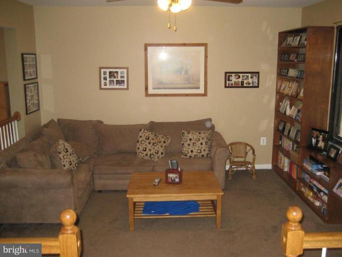 8987 Centerway Road Gaithersburg, MD 20879 - Photo 2 of 19 Step-Down Living Room