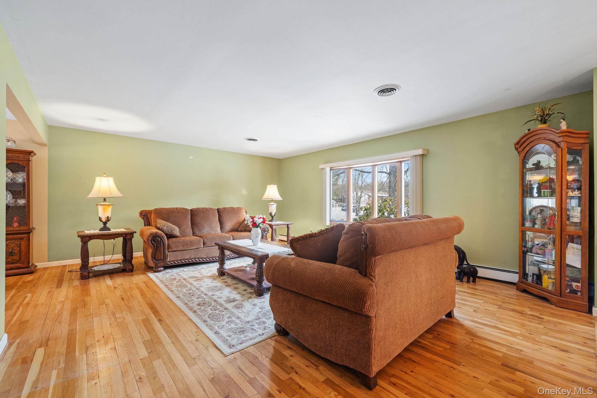 38 Haller Crescent Spring Valley, NY 10977 - Photo 4 of 24 Large living room with bay window