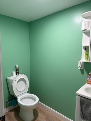 10 Byron Street Worcester, MA 01605 - Photo 21 of 33 a bathroom with a toilet and a sink