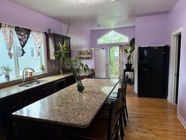 10 Byron Street Worcester, MA 01605 - Photo 6 of 33 a kitchen with stainless steel appliances granite countertop a sink refrigerator and cabinets