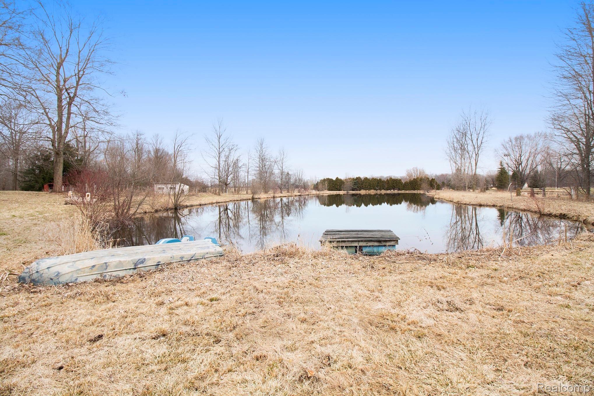 8475 Mason Road Fowlerville, MI 48836 - Photo 2 of 63 Gorgeous pond is approx 1.5 acres