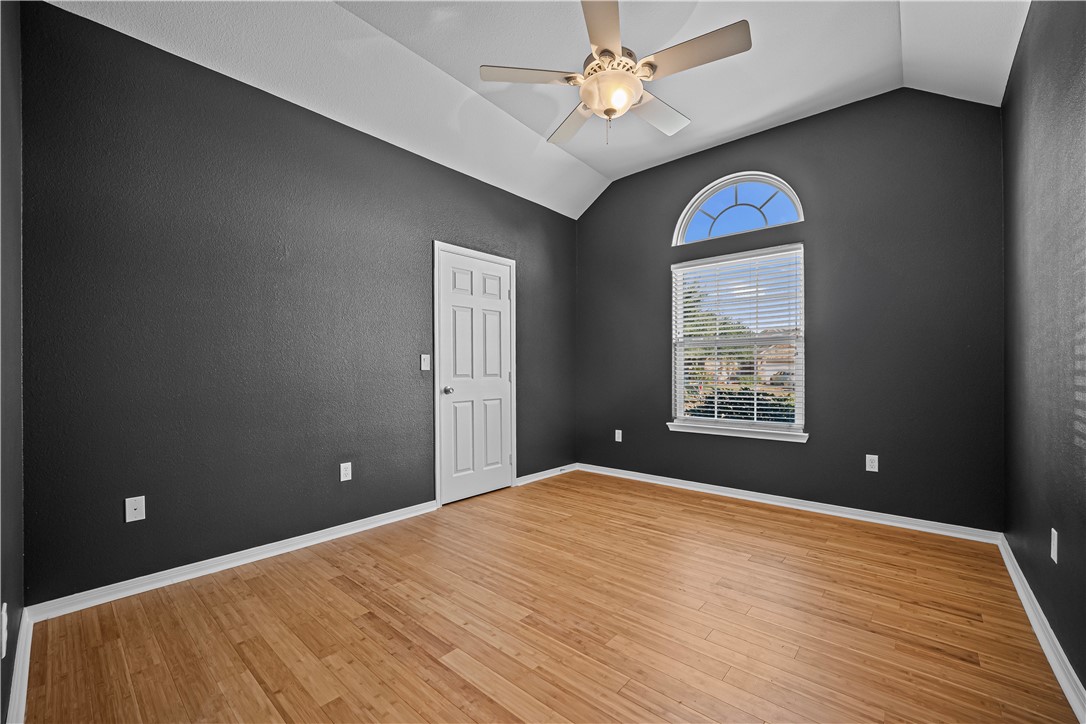 7509 Exeter Corpus Christi, TX 78414 - Photo 19 of 29 wooden floor in a room next to a window
