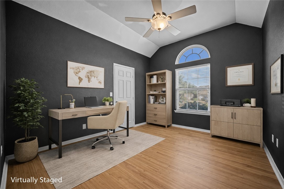 7509 Exeter Corpus Christi, TX 78414 - Photo 20 of 29 a view of a workspace with furniture and a window