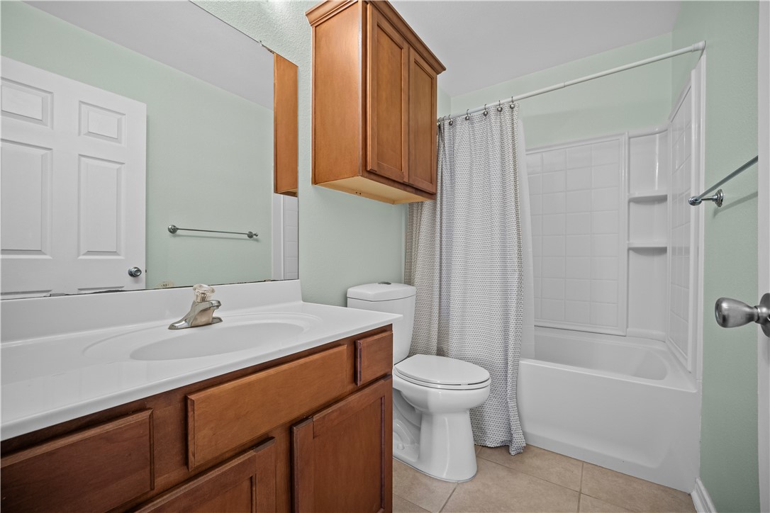 7509 Exeter Corpus Christi, TX 78414 - Photo 23 of 29 a bathroom with a sink toilet and shower