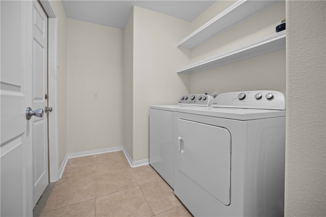 7509 Exeter Corpus Christi, TX 78414 - Photo 24 of 29 a utility room with dryer and washer