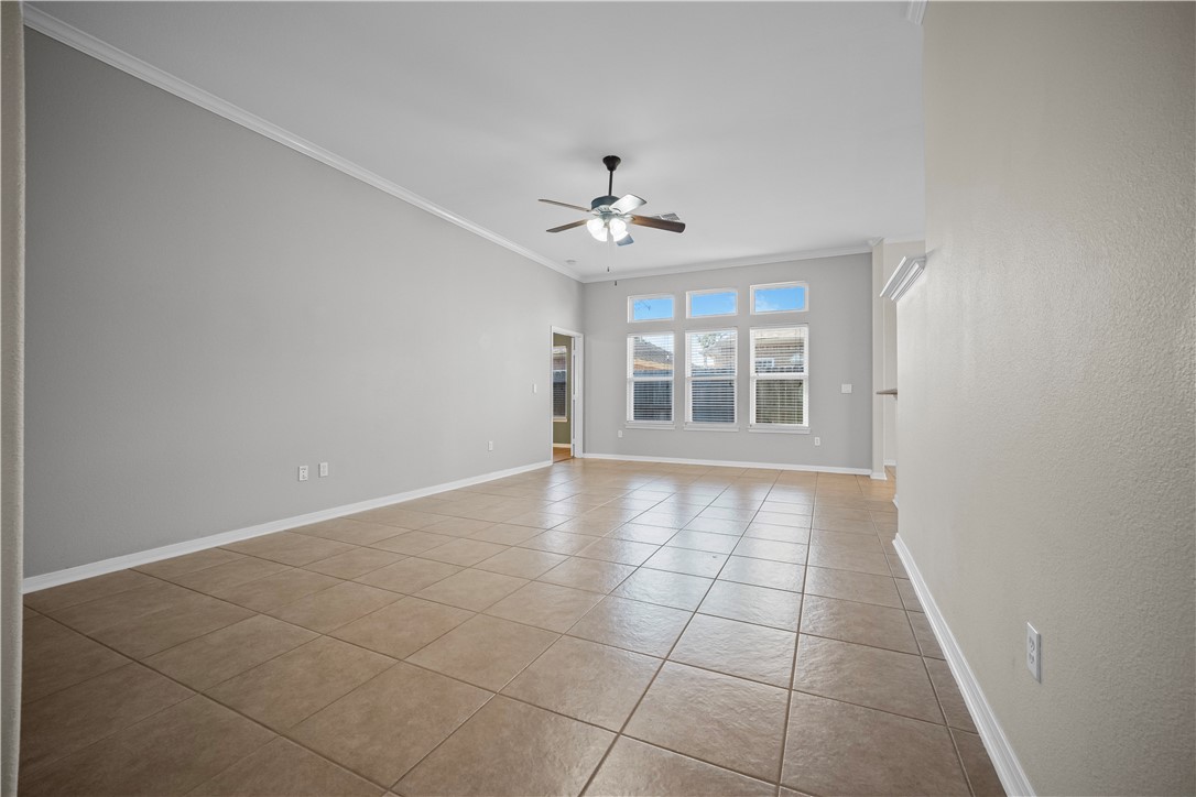 7509 Exeter Corpus Christi, TX 78414 - Photo 4 of 29 a view of an empty room with a window