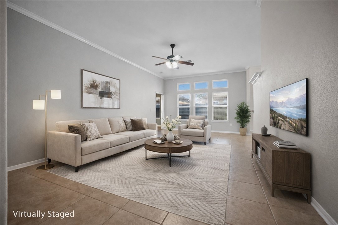 7509 Exeter Corpus Christi, TX 78414 - Photo 5 of 29 a living room with furniture and a flat screen tv