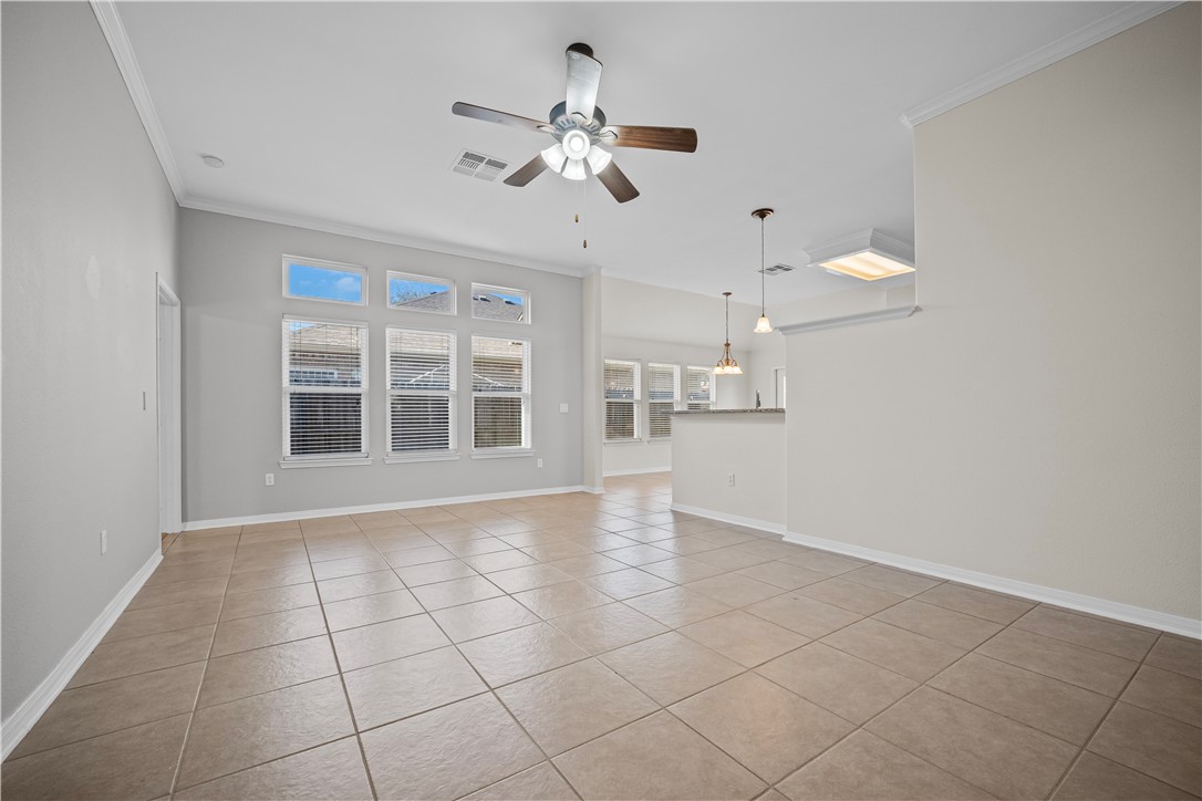 7509 Exeter Corpus Christi, TX 78414 - Photo 6 of 29 a view of an empty room with a window