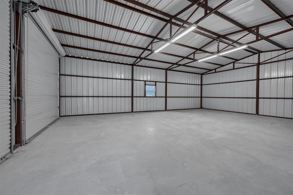 25 Pear Tree Lane Collinsville, TX 76233 - Photo 31 of 34 a view of a garage