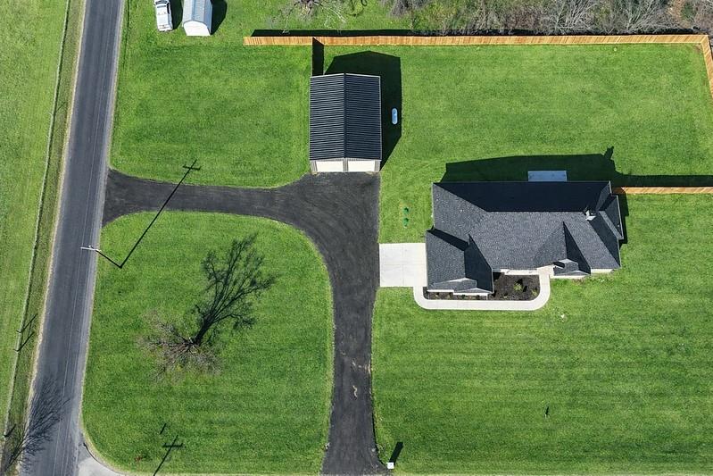 25 Pear Tree Lane Collinsville, TX 76233 - Photo 6 of 34 a aerial view of a house with a yard