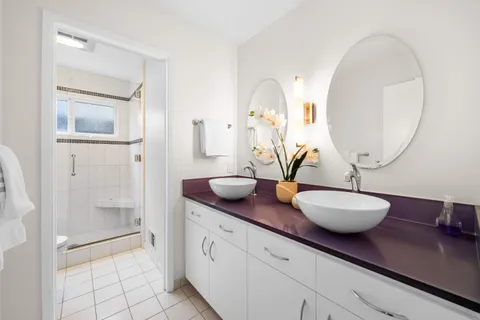 a kitchen with sink and window