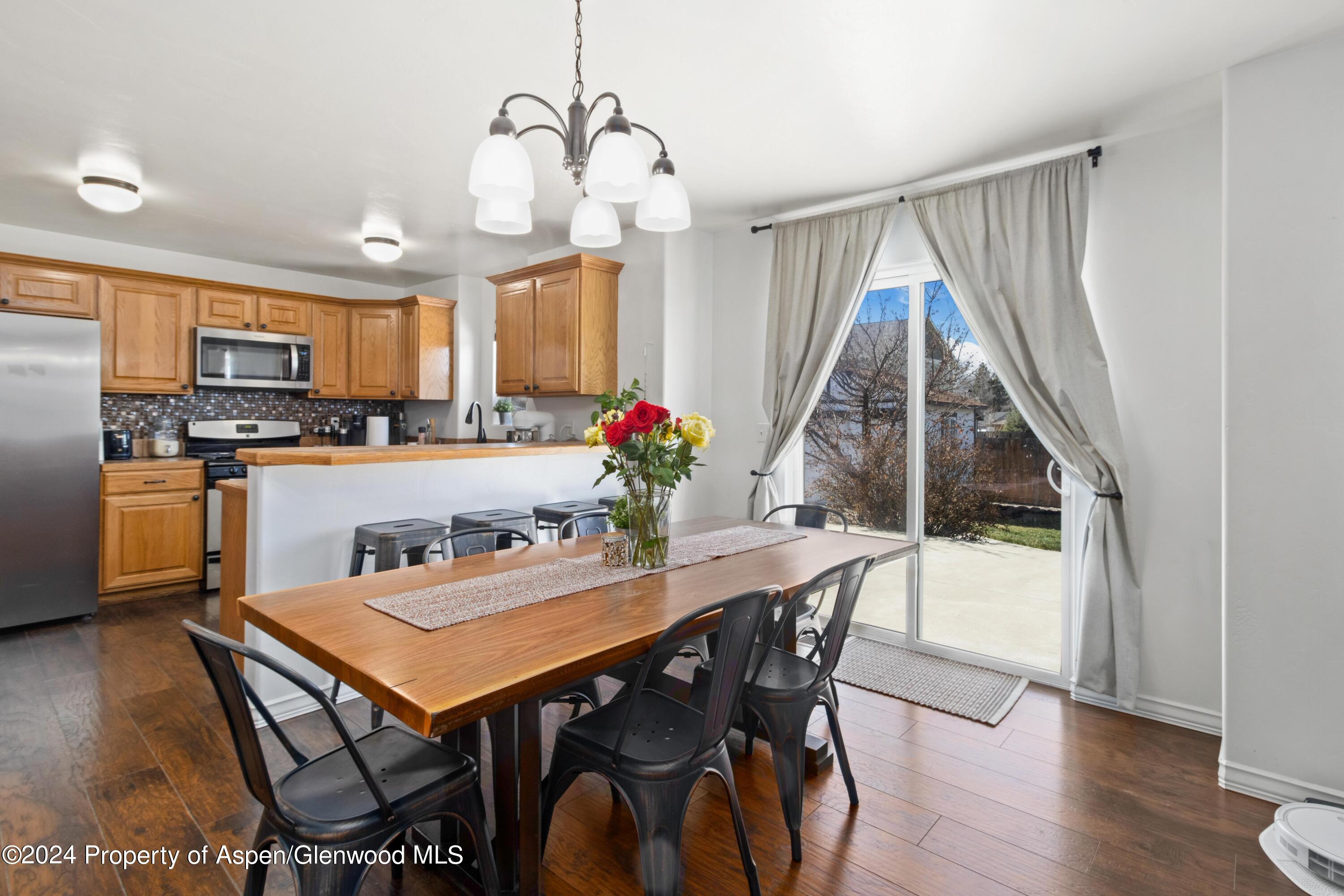 1225 East 18th Way Rifle, CO 81650 - Photo 4 of 20 dining into kitchen