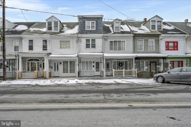 a black white building with a lots of windows