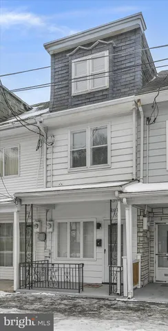 a front view of a building with glass windows