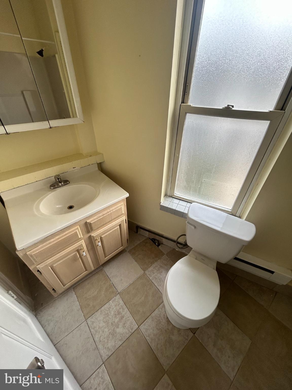 349 Pearl Street Reading, PA 19602 - Photo 11 of 17 Bright and airy bathroom with modern fixtures.