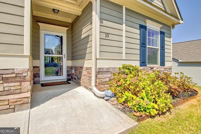 a view of a entryway door front of house