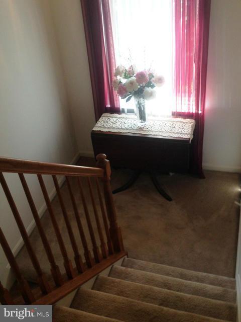 1801 Lottie Fowler Road Prince Frederick, MD 20678 - Photo 14 of 21 a bathroom with a sink and a mirror