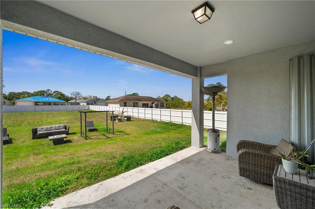 3407 20th Street Southwest Lehigh Acres, FL 33976 - Photo 21 of 23 a living room with furniture