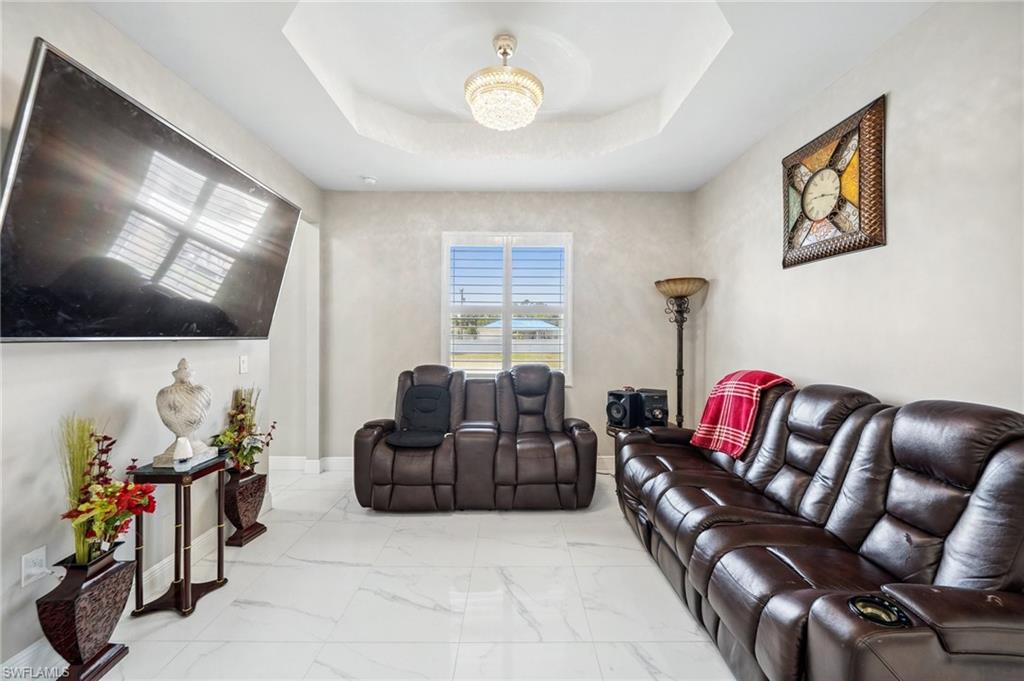 3407 20th Street Southwest Lehigh Acres, FL 33976 - Photo 10 of 23 a living room with furniture