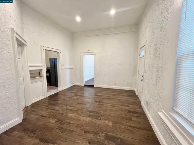 a view of an empty room and window