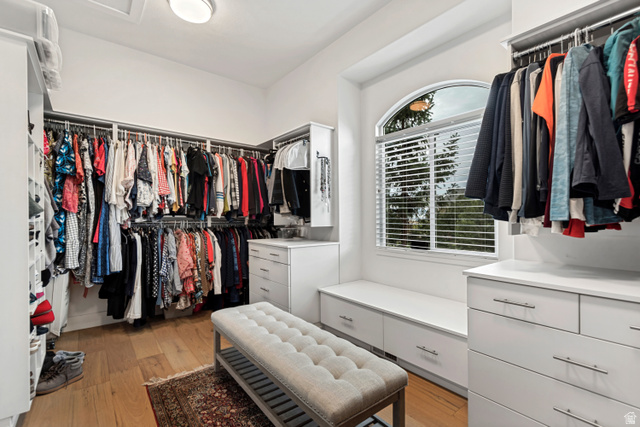 1912 Somerset Ridge Drive Draper, UT 84020 - Photo 23 of 45 Custom closet system with extensive hanging storage and a built-in window bench