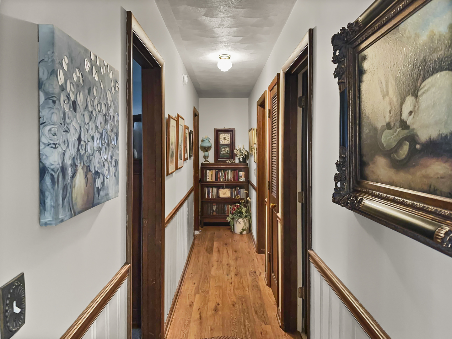 447 South Ralph Street Watseka, IL 60970 - Photo 11 of 20 a view of a hallway with wooden floor and stairs