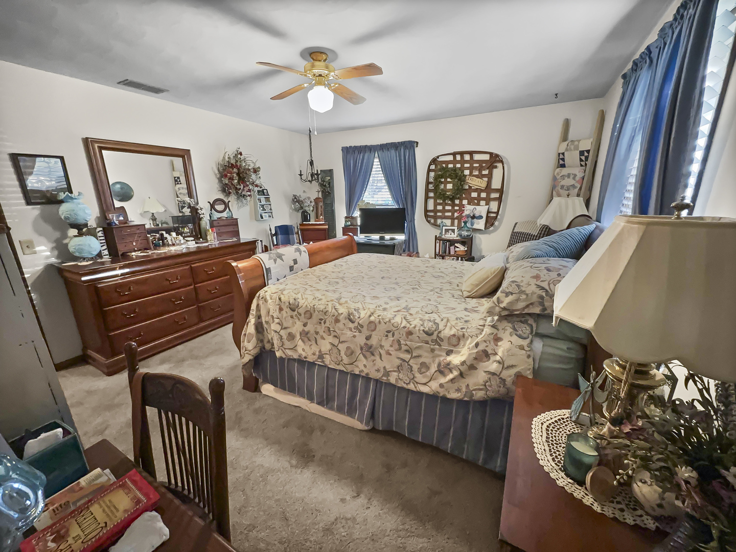 447 South Ralph Street Watseka, IL 60970 - Photo 13 of 20 a bedroom with furniture and a mirror