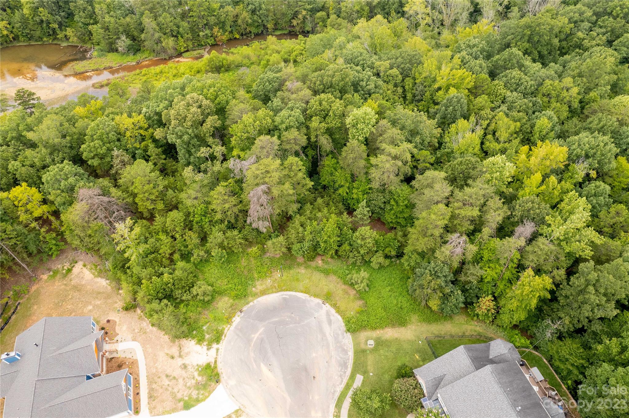680 Reliance Court Tega Cay, SC 29708 - Photo 12 of 20 a view of a tree in a garden