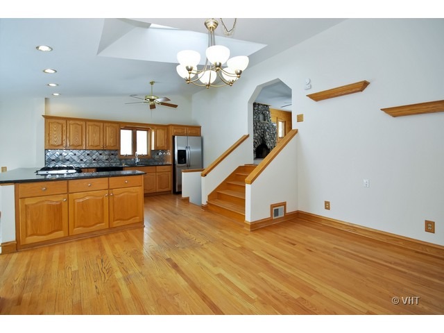35W503 Riverside Drive St. Charles, IL 60174 - Photo 4 of 10 a view of kitchen with stove and hallway