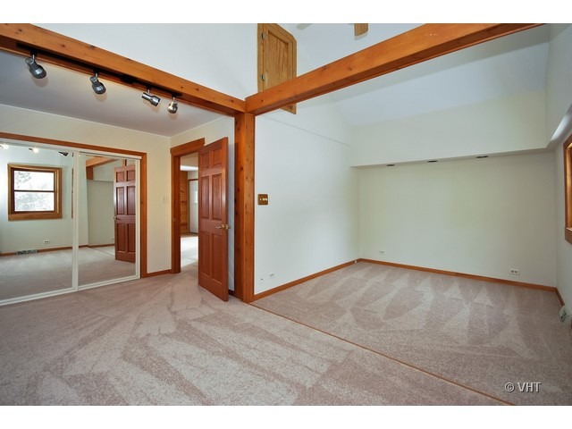 35W503 Riverside Drive St. Charles, IL 60174 - Photo 6 of 10 a view of an empty room with wooden floor