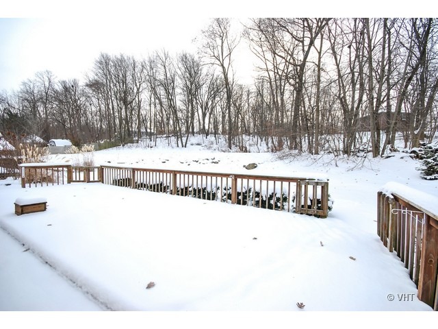 35W503 Riverside Drive St. Charles, IL 60174 - Photo 10 of 10 a view of a balcony with trees